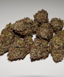 Dense, silver-coated Super Silver Haze cannabis buds with vibrant orange hairs and frosty trichomes, showcasing premium sativa quality.