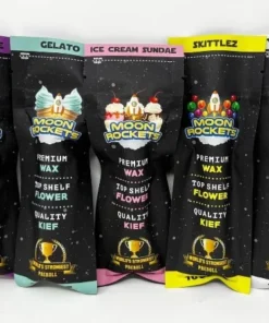 Moon Rocket Pre Roll in sleek packaging, showcasing vibrant green buds with a hint of orange pistils.