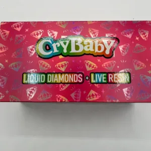 A CryBaby 2G disposable vape device, featuring its unique design and branding, showcased against a clean backdrop to highlight its vibrant colors.